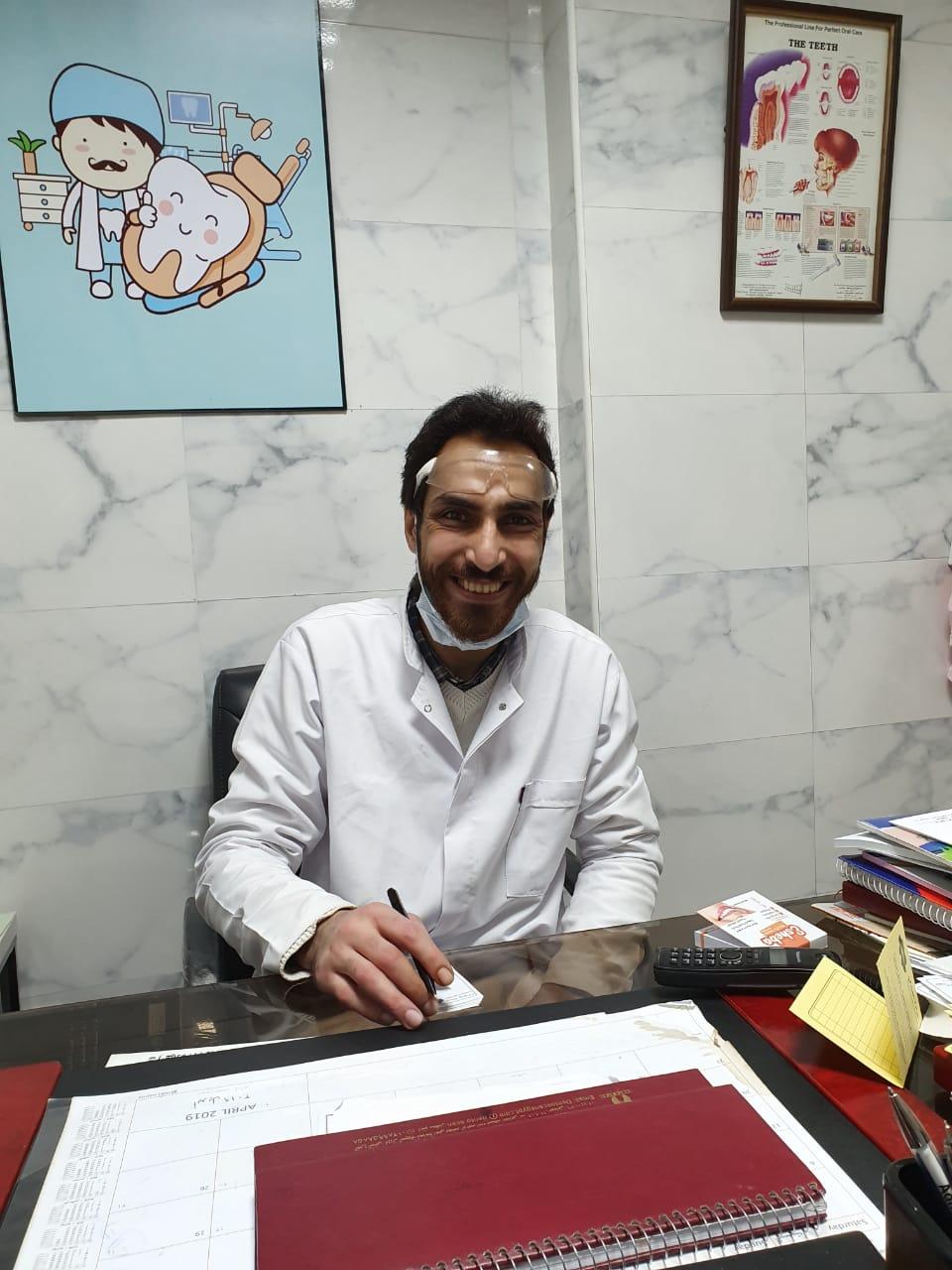 دكتور محمد علاء العادلي أخصائي جراحه الفم و تجميل الاسنان